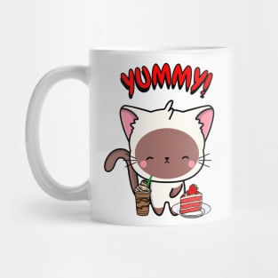 Cute white cat is having coffee and cake Mug